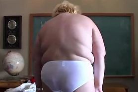 Chunky teacher plays with her big boobs and soaking wet pussy