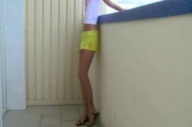 Fucking hot brunette clothed on the balcony of the building