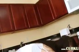 blackhair in the kitchen with huge toy - video 1