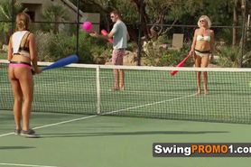 Amateur swinger couples play games in the garden of swing mansion
