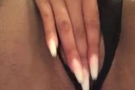 Sexy ebony with long nails playing on camera