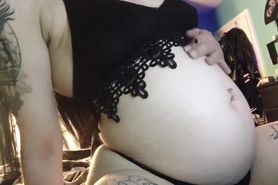 Brunette goth with a MASSIVE round stuffed belly