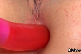 Sweet girl is gaping narrowed pussy in closeup and having orgasm