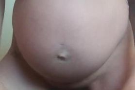8 months pregnant hot MILF girl getting to business with big dildo