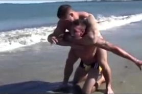 Bodybuilder Beach Wrestling