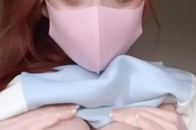 Masked hot beautiful girl exposes and squeezes her busty fair tits