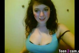 Busty teen brunette reveals her tits
