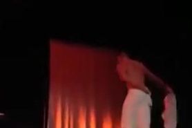 Guys perform naked in front of a crowd