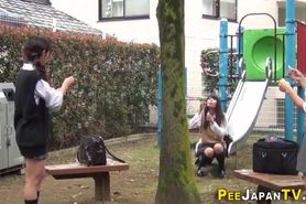 Teen students urinating outdoors