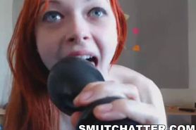 Petite amateur redhead toys herself on web cam