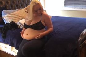 bbw plays with her belly on bed