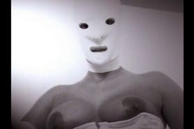 Hot White Latex Mask Wearing Lady Giving A Kinky Cigar Smoking Blowjob