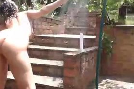 South African girl showering outside