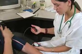 Female Doctor Measures His Stick - video 1