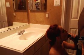 Very busty redhead is screwed rough by big black cock in bathroom