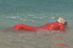 Red Latex Mermaid on the Beach
