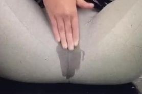 Masturbating and pissing in her leggings