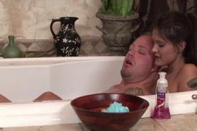 Wife sooths her man dreams inside the bathtub