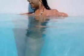 Naughty undine naked in the swimmingpool - video 1
