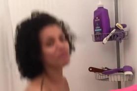Having fun sucking and fucking my dildo in the shower