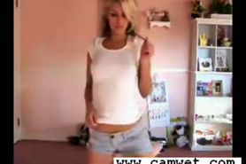 Super cute blond teen strips and fingers her shaved pussy