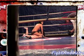 Muscular lesbians wrestling in the boxing ring
