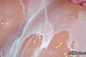 Kinky lesbians fill up their oversized asses with cream and squirt it out