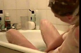 Cute teen caught in bath - video 1