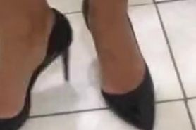 Soaking her high heels in piss