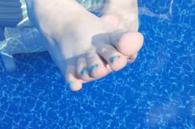 MILF Mistress Vixie's Soles And Toes In The Pool.