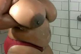 BBW ebony take a shower to wash her monster boobs