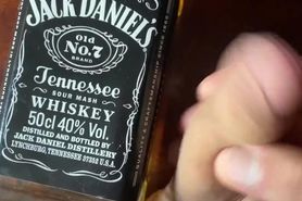 Sweet boy at hotel room mastrubate his cock with big whiskey bottle