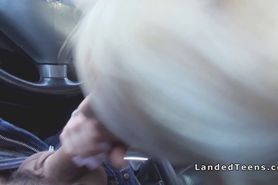 Blonde with red lips sucks cock in car