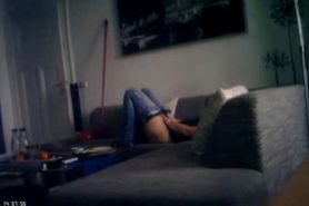 Horny chick fingering in the couch
