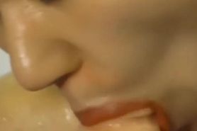 Sensual Ann Kuraki plays with a big dildo