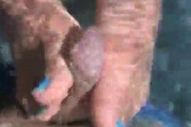 Brianna gives a footjob in the pool