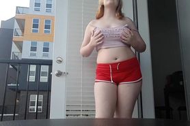 Playing With My Natural Boobs On The Balcony