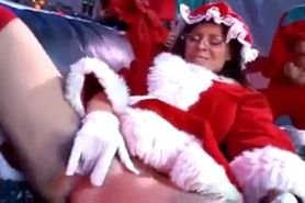 Mrs. Clause get naughty with the elvs