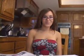 brunette student in glasses gets distracted from home