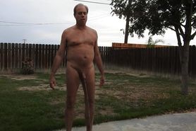A naked daddy pees in public for his pornsite fans.