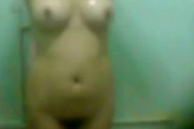 Cute latina caught showering by a peeper