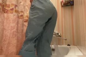 Girl with cool ass pee in jeans, play with shower and play with pussy until she cum
