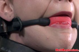BDSM sub gagged and restrained in a ball