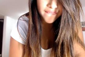 Sexy teen plays in front of her webcam