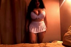Chubby brunette shows her huge natural tits on webcam