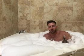 Handsome aesthetic bodybuilder with short cock flex his muscles in bathroom