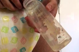 Diaper Boy Pisses in Baby Bottle