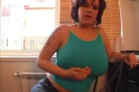 Iva smokes and shows her big tits