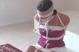 tape gagged, blindfolded and tied with lots of rope. Struggling too!