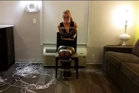 Chairtied girl struggles to get loose